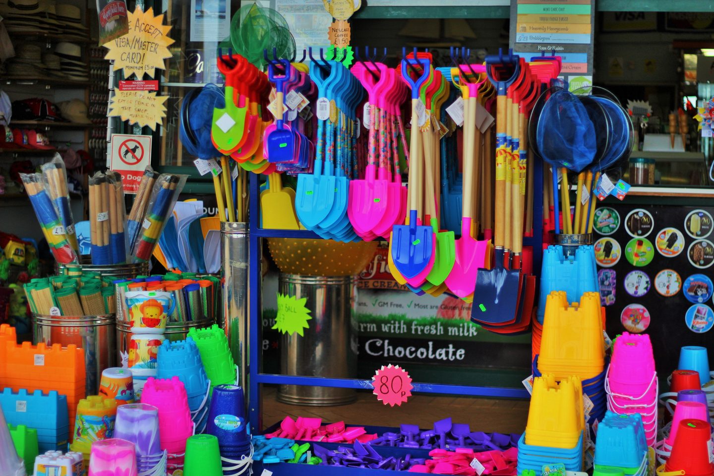 Seaside buckets and spades and accessories outside a shop 